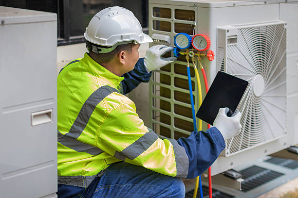 Professional Air Conditioning Repair technician working in Bellaire, OH
